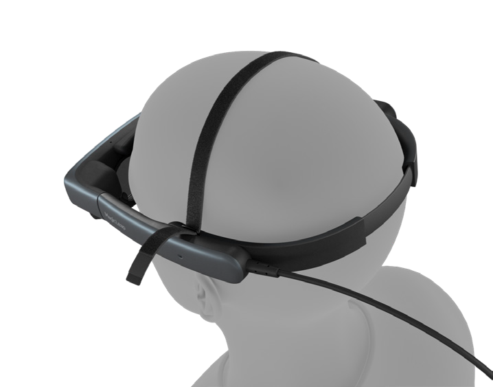 The headstrap being looped through the Magic Leap 2's headset.