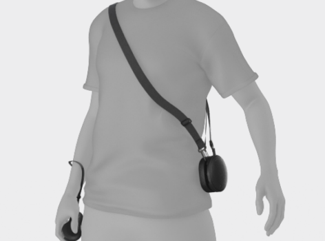 A person wearing the compute pack like a messenger bag using the shoulder strap